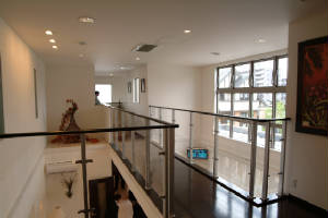 ViewFrom2ndFloorBridgeLookingDownLivingRoomJapanYurekModelHome.JPG